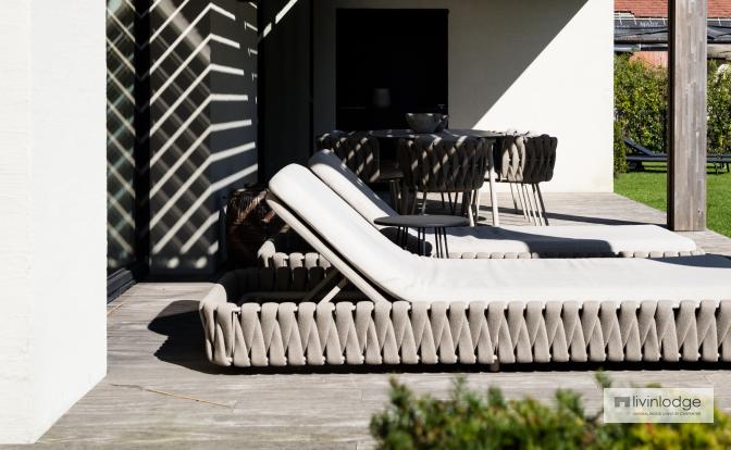 Wooden louvers create a beautiful light effect on a patio