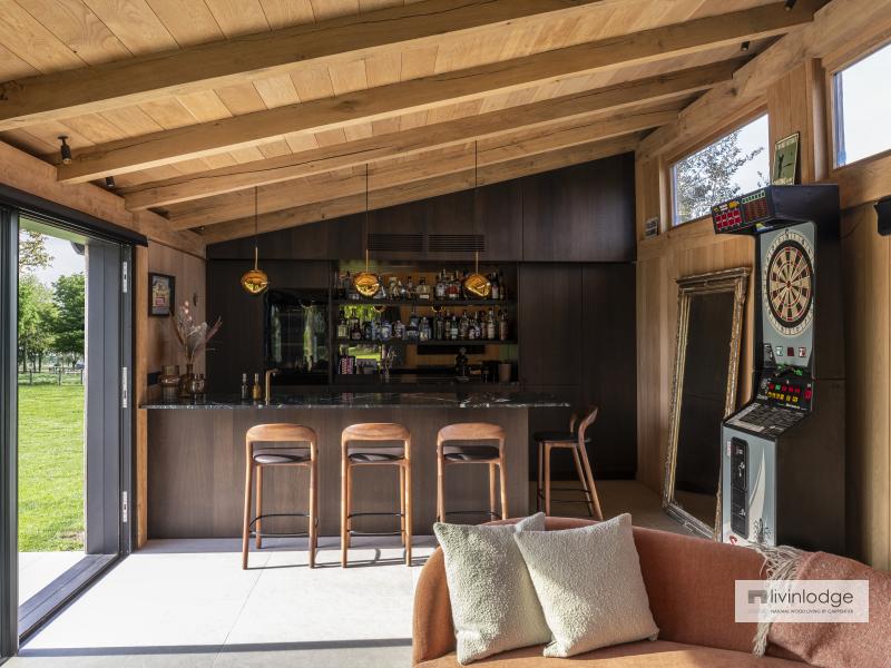 Modern lounge with bar in a bespoke wooden outbuilding