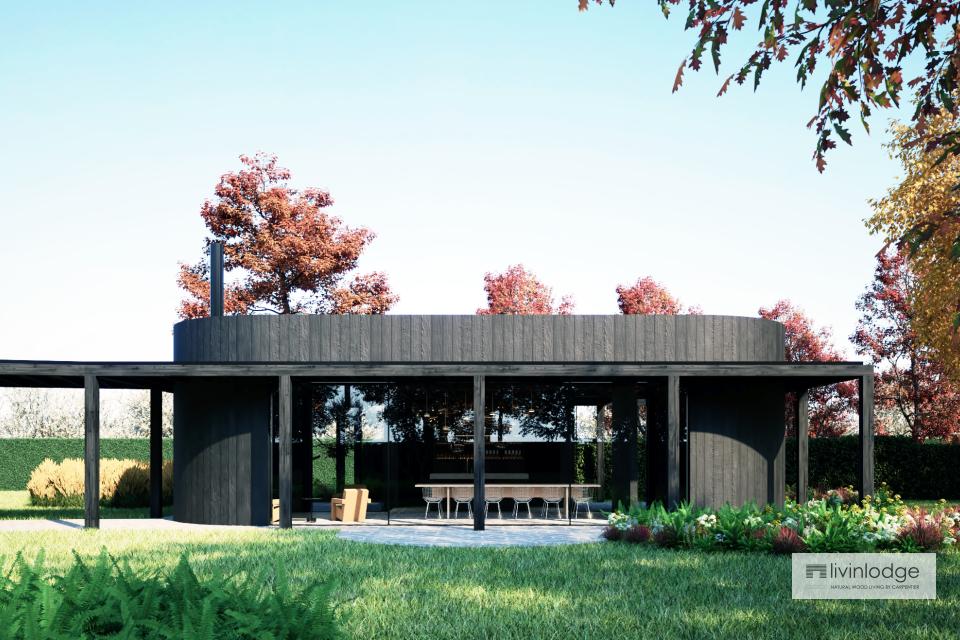 Modern wooden outbuilding with round lines